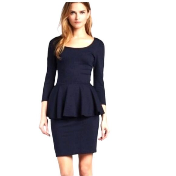 Alice and Olivia Employed Black Knit Peplum Mini Dress | Size 2 - Picture 1 of 7